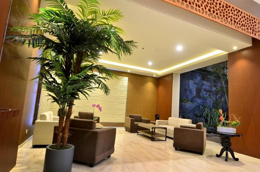 Posezení v ubytování Ascent Premiere Hotel and Convention