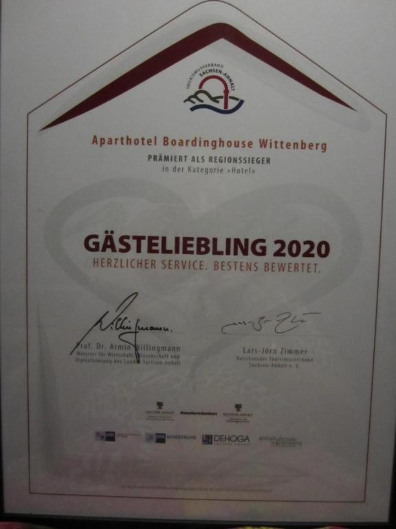 Certifikát, hodnocení, plakát nebo jiný dokument vystavený v ubytování Boardinghouse Wittenberg