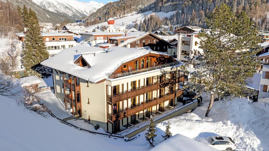 an aerial view of a building in the snow at Banyan in Sankt Anton am Arlberg