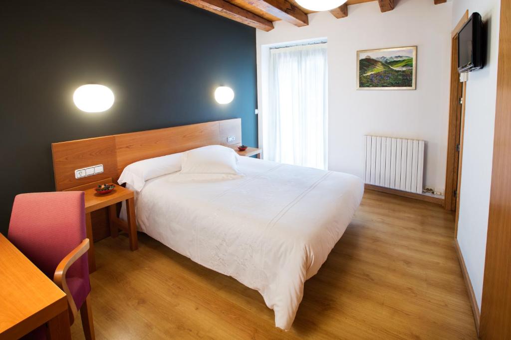 Postel nebo postele na pokoji v ubytování Allotjament Rural Cal Miquel