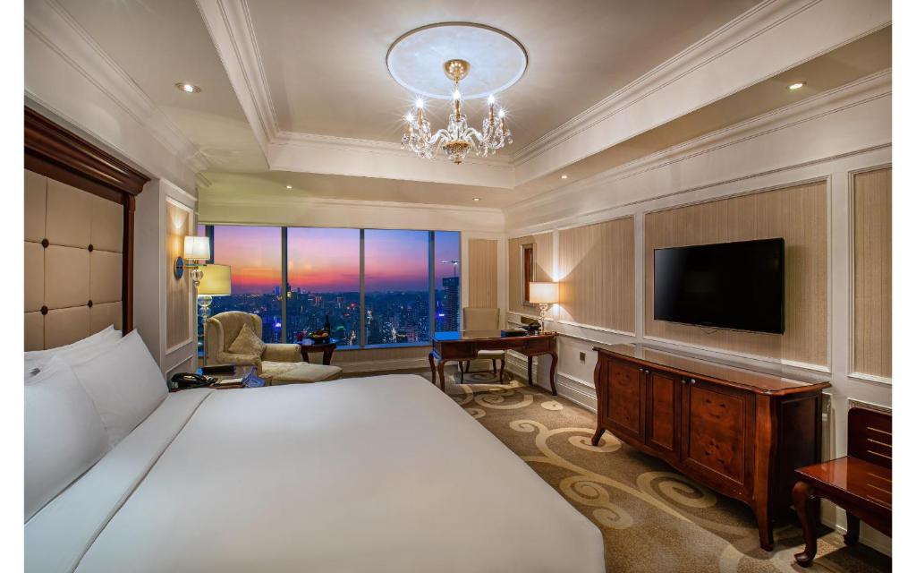 Postel nebo postele na pokoji v ubytování Kempinski Hotel Guiyang