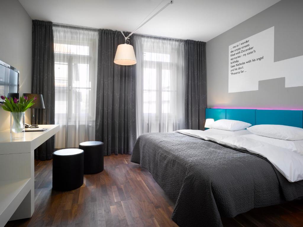 Postel nebo postele na pokoji v ubytování MOODs boutique hotel