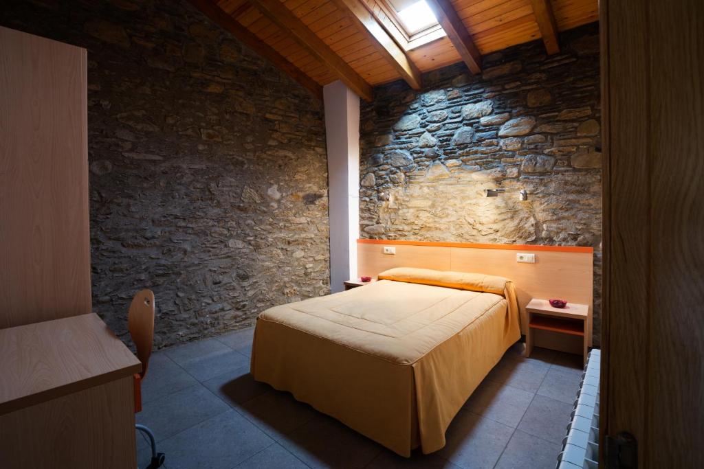 Postel nebo postele na pokoji v ubytování Allotjament Rural Cal Miquel
