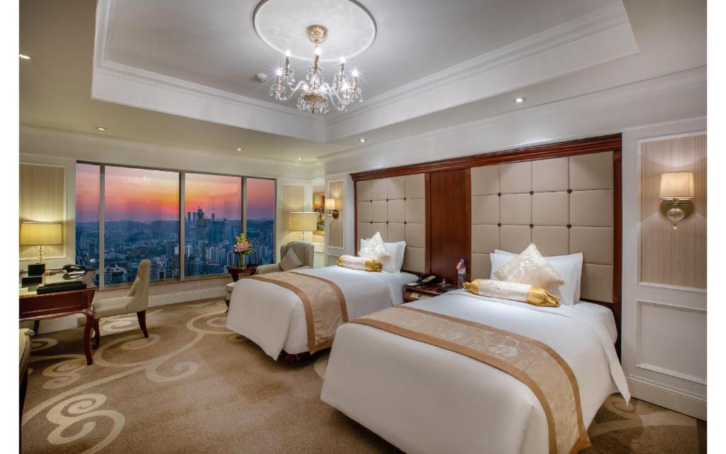 Postel nebo postele na pokoji v ubytování Kempinski Hotel Guiyang
