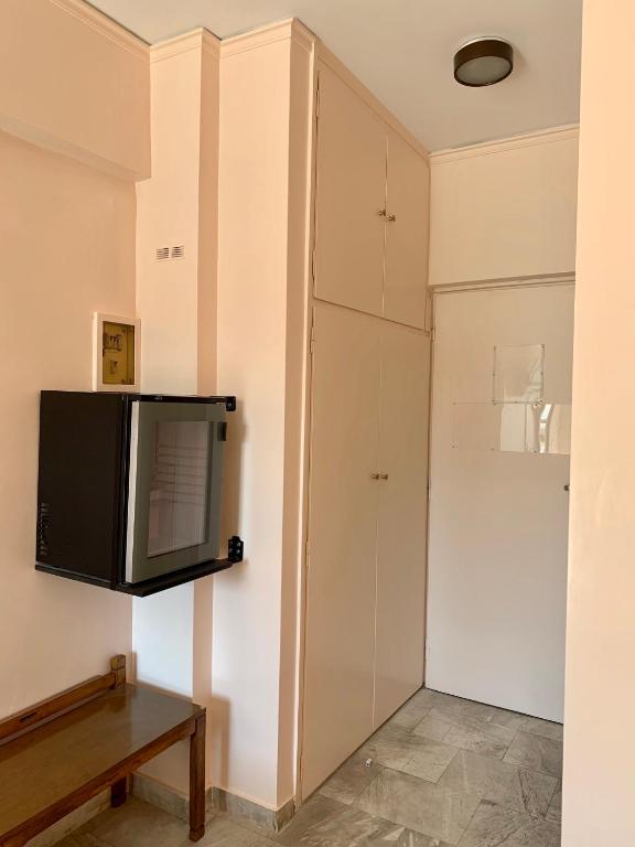 TV a/nebo společenská místnost v ubytování Hotel Cosmos