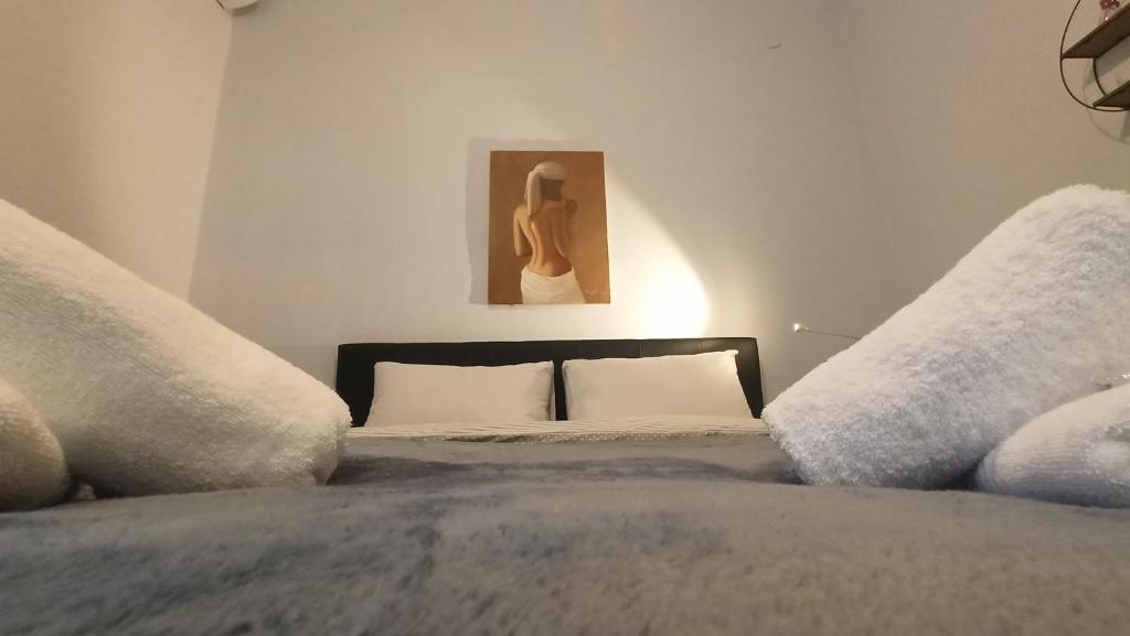 Postel nebo postele na pokoji v ubytování Deppy's Apartments