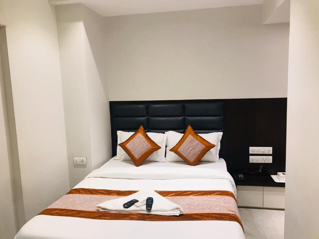 Postel nebo postele na pokoji v ubytování Hotel Flora Suites - Fort