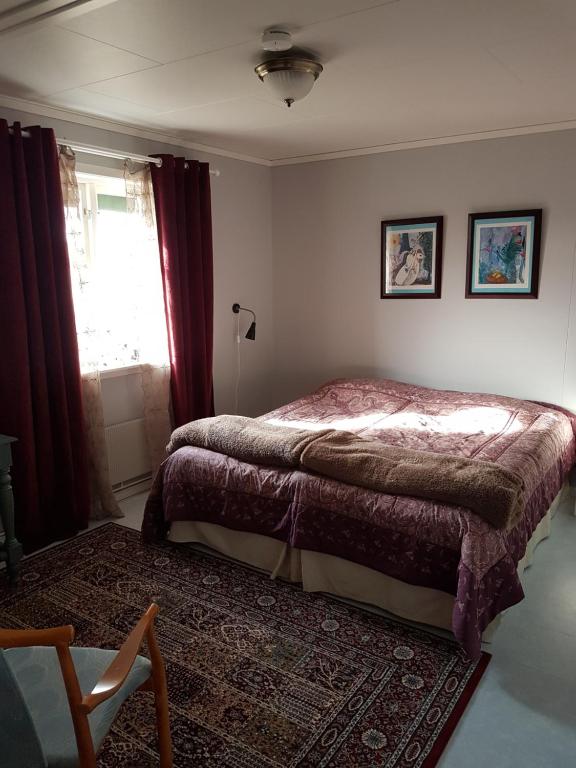 Postel nebo postele na pokoji v ubytování Skogsbrynet B&B, Bredsjö Nya Herrgård