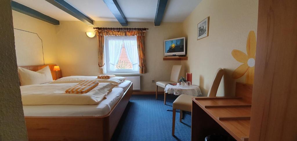 Postel nebo postele na pokoji v ubytování Hotel Schatthaus