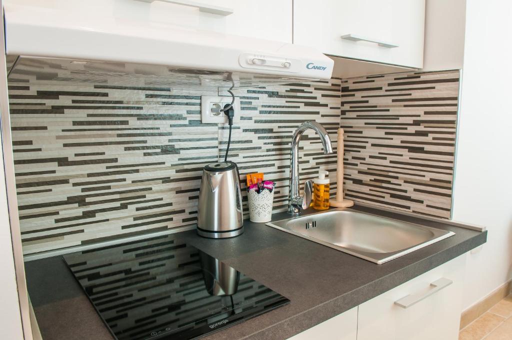 Kuchyňa alebo kuchynka v ubytovaní Bazzar Apartments