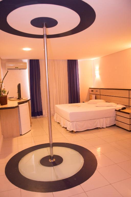 Postel nebo postele na pokoji v ubytování Motel KamaSutra