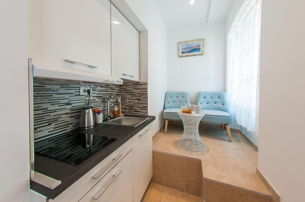 Kuchyňa alebo kuchynka v ubytovaní Bazzar Apartments
