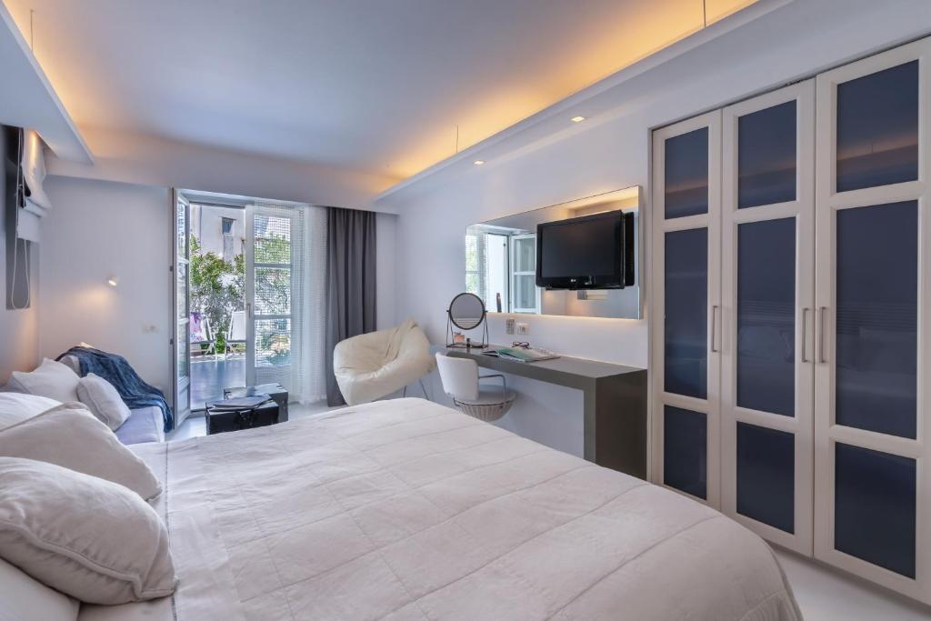 Posteľ alebo postele v izbe v ubytovaní Semeli Hotel Mykonos