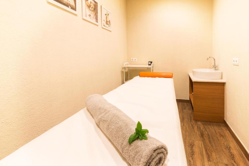 Postel nebo postele na pokoji v ubytování Hostal Trainera