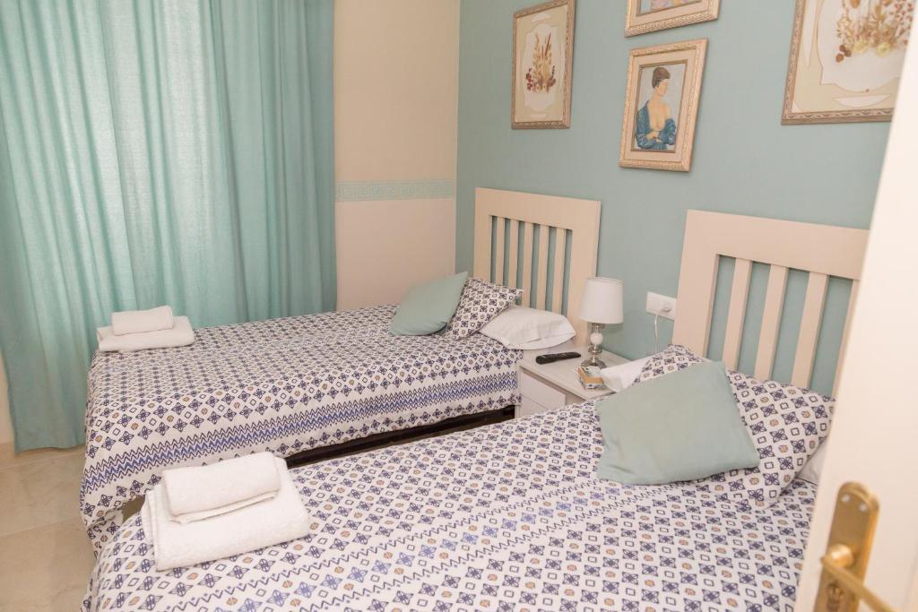 Cama o camas de una habitación en Pension Internacional
