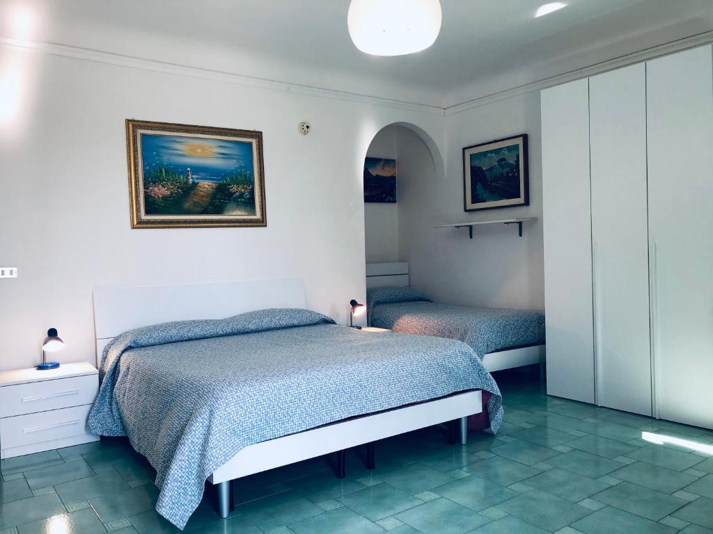 Katil atau katil-katil dalam bilik di Hotel Falco D'oro