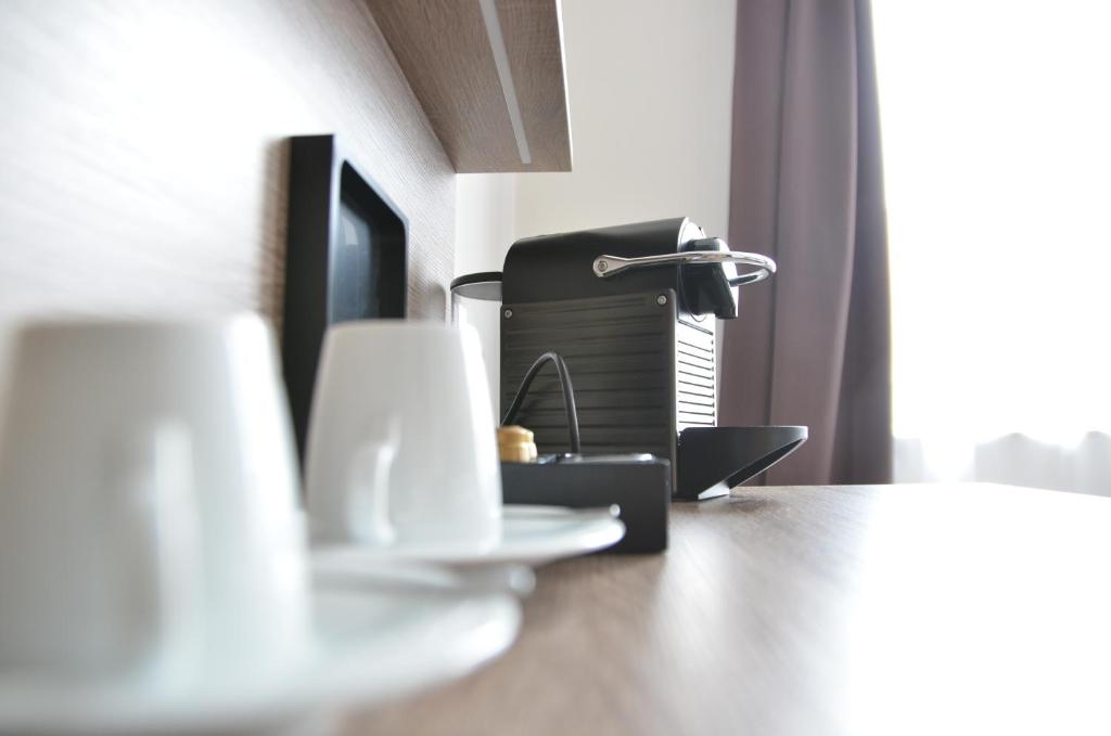 TV a/nebo společenská místnost v ubytování Hotel Langhans