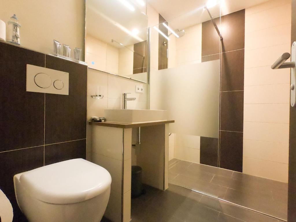 Koupelna v ubytování Hotel Langhans
