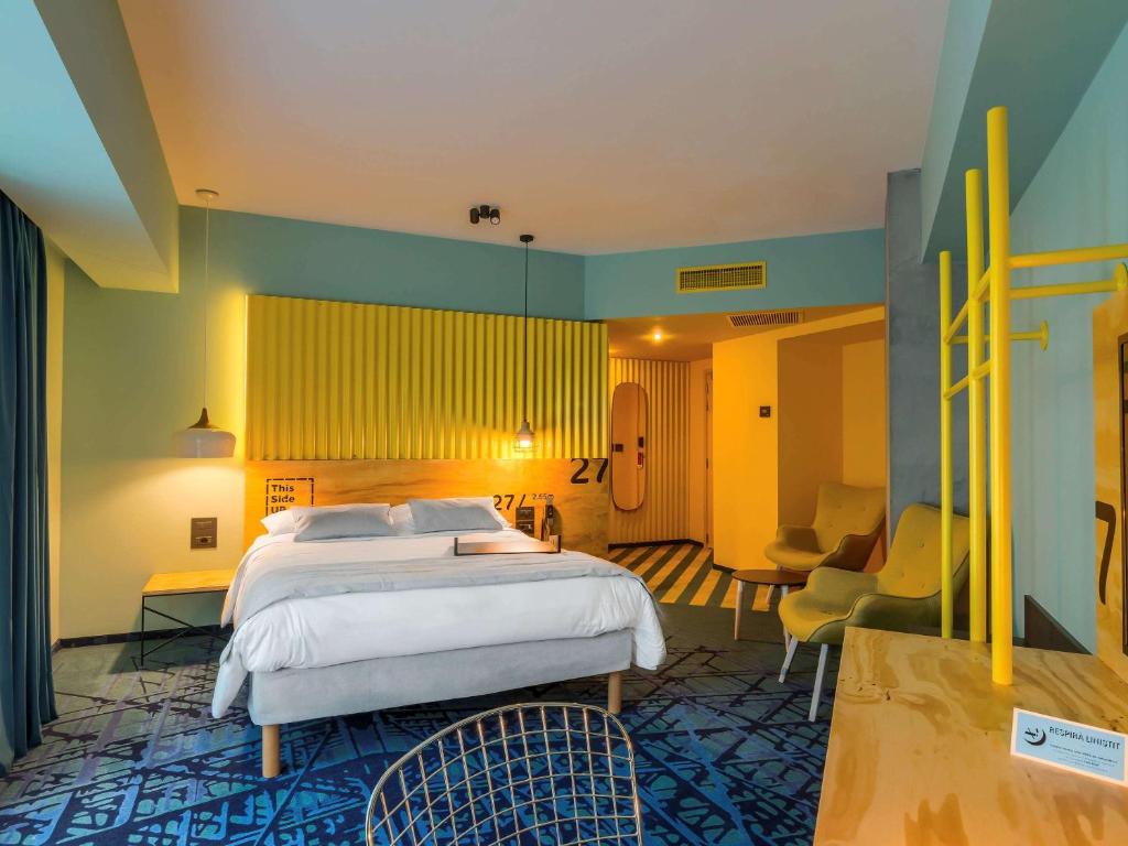 Postel nebo postele na pokoji v ubytování ibis Styles Bucharest Erbas