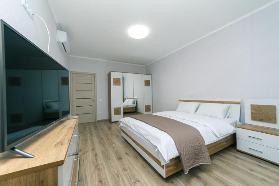 Televízia a/alebo spoločenská miestnosť v ubytovaní New VIP Apartments