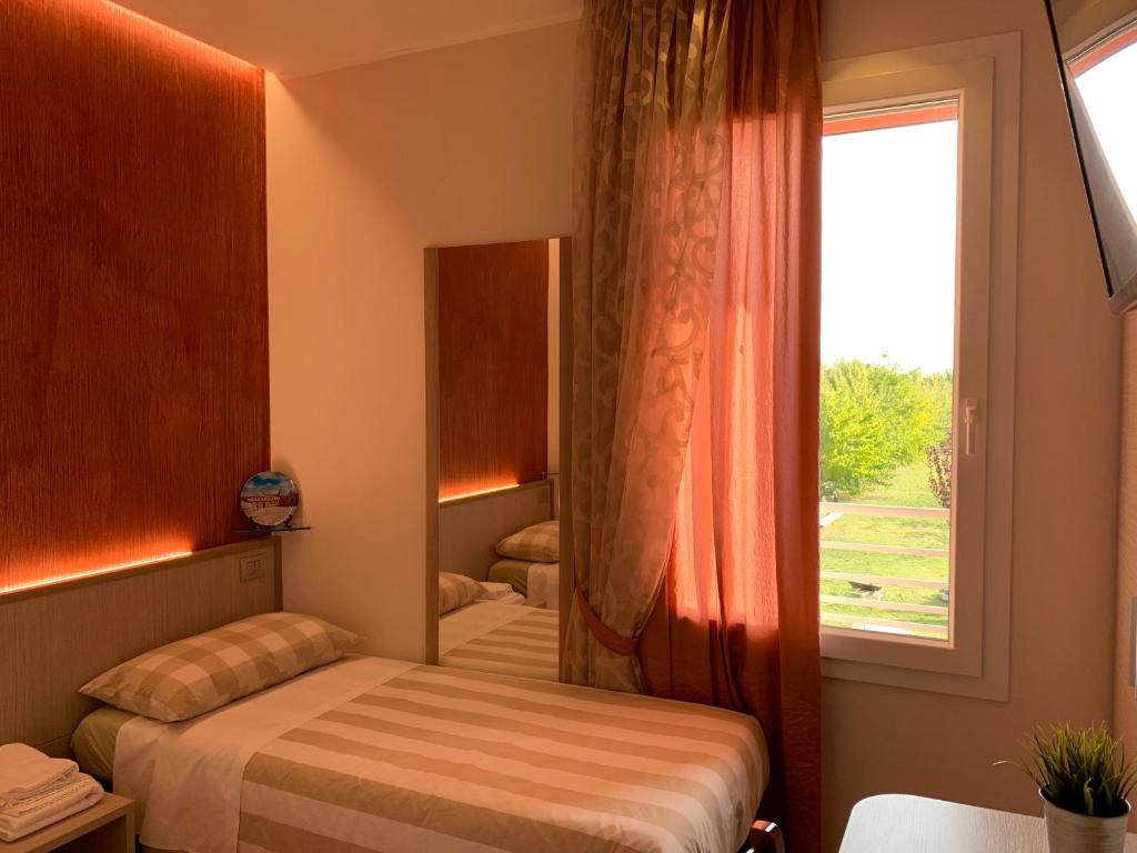 Posteľ alebo postele v izbe v ubytovaní Le 3 Botti Locanda