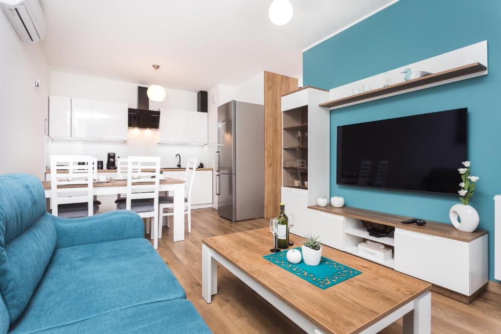 Televízia a/alebo spoločenská miestnosť v ubytovaní City of the Kings - Wolf Apartment