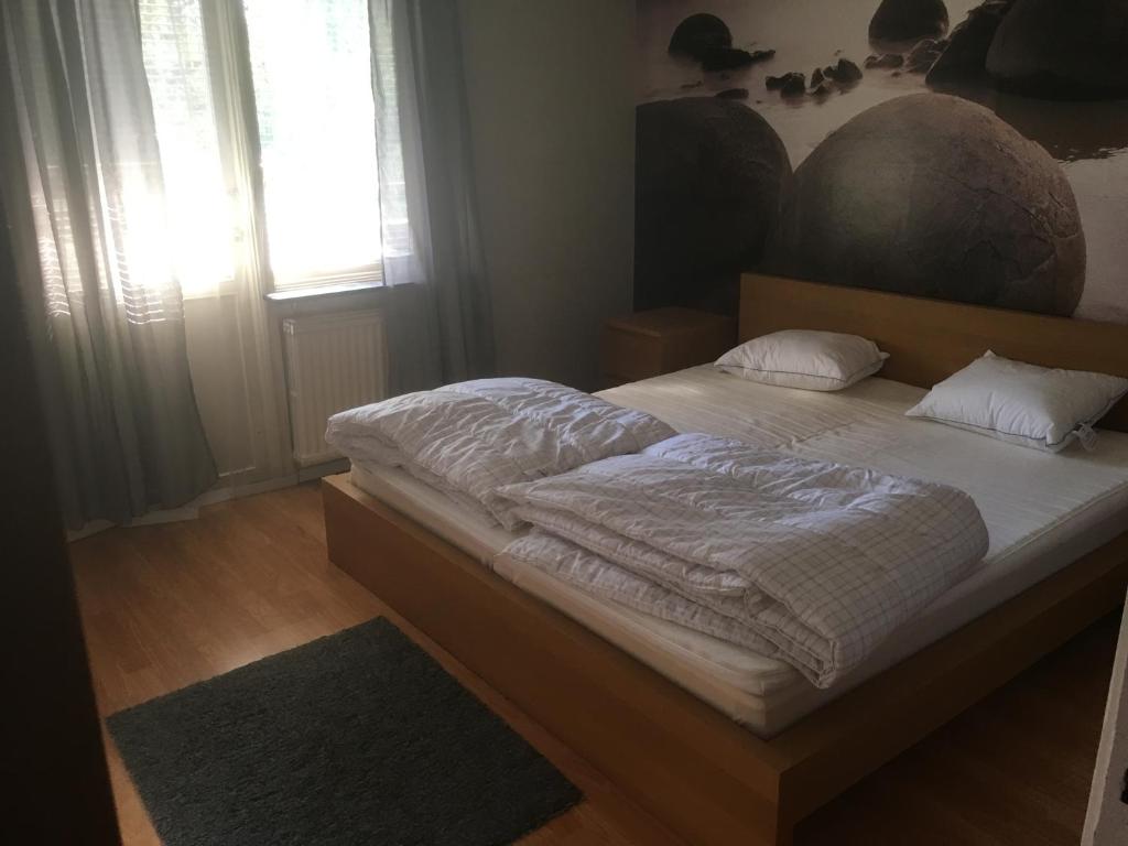 Postel nebo postele na pokoji v ubytování Villa Aspedalsgatan