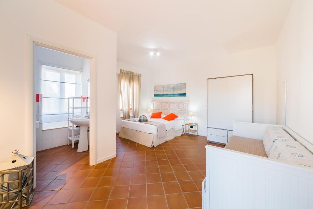 Кровать или кровати в номере CircEea Beach B&B
