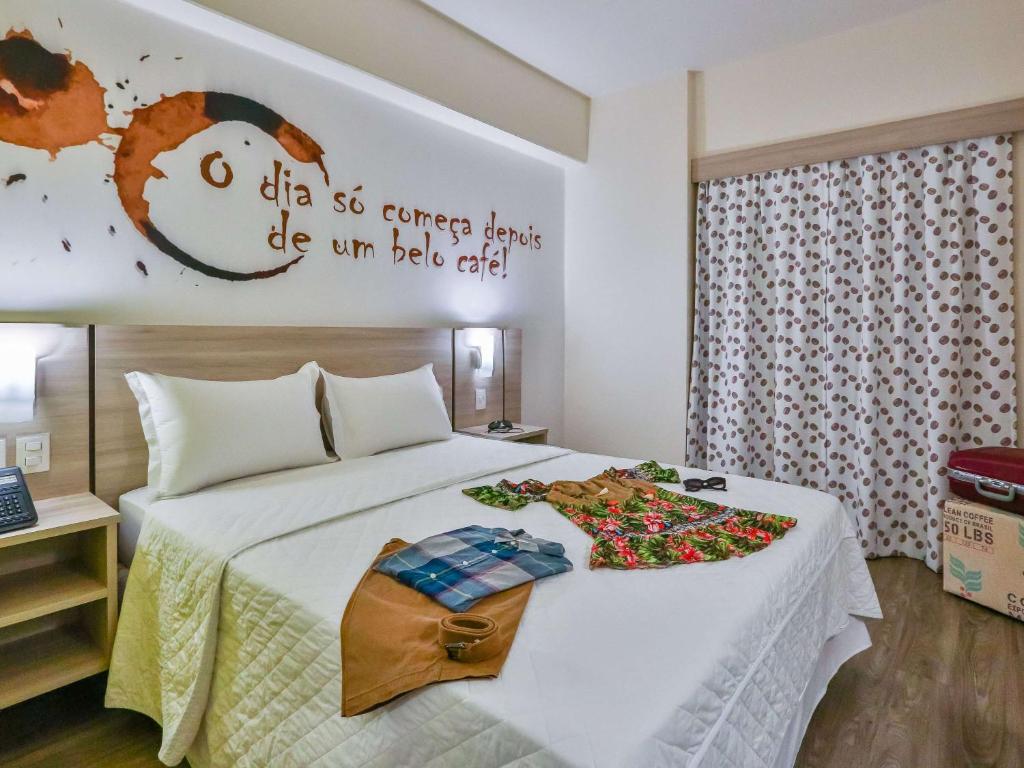 Postel nebo postele na pokoji v ubytování ibis Styles Vitoria da Conquista