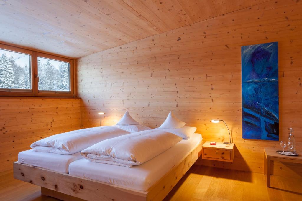 Postel nebo postele na pokoji v ubytování Biohotel Mattlihüs