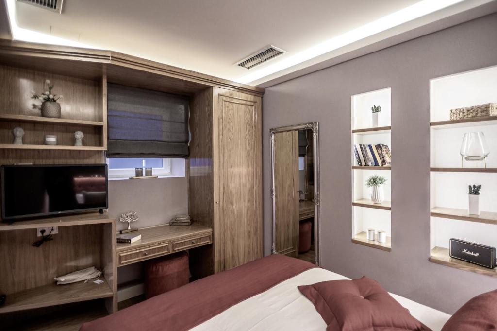 Posteľ alebo postele v izbe v ubytovaní Opus 5 Luxury Apartment in Liston Corfu