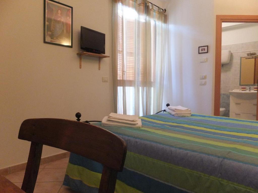 Postel nebo postele na pokoji v ubytování Cascina Antonini