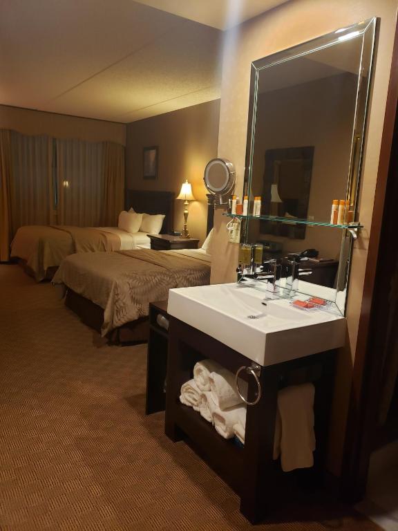 Postel nebo postele na pokoji v ubytování Salvatores Grand Hotel