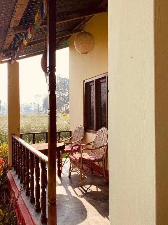 Balkón nebo terasa v ubytování Bardia Eco Friendly Homestay