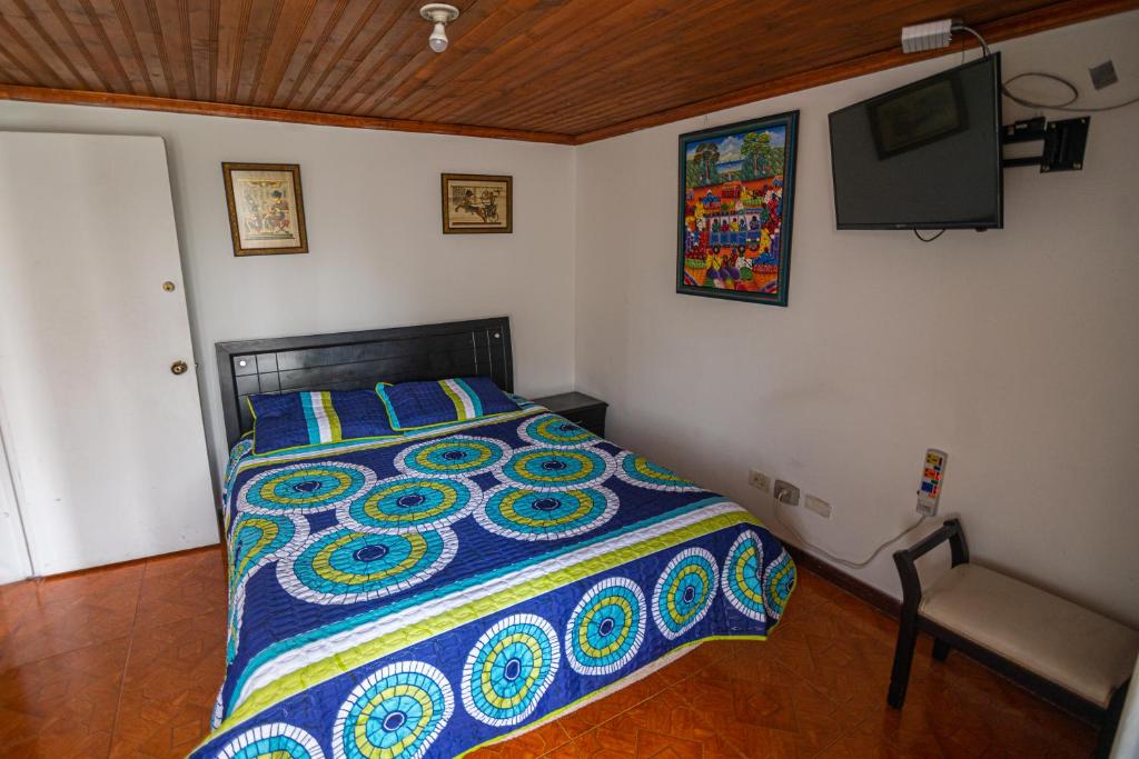 Postel nebo postele na pokoji v ubytování Vivienda Turística "El Coronel"