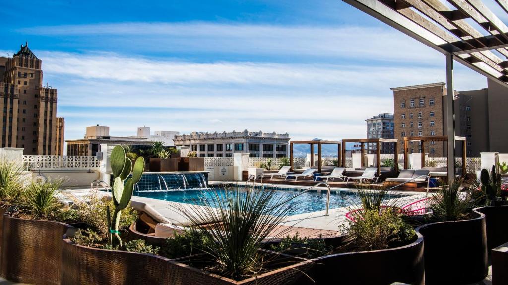 a pool on the roof of a building at Hotel Indigo El Paso Downtown by IHG in El Paso