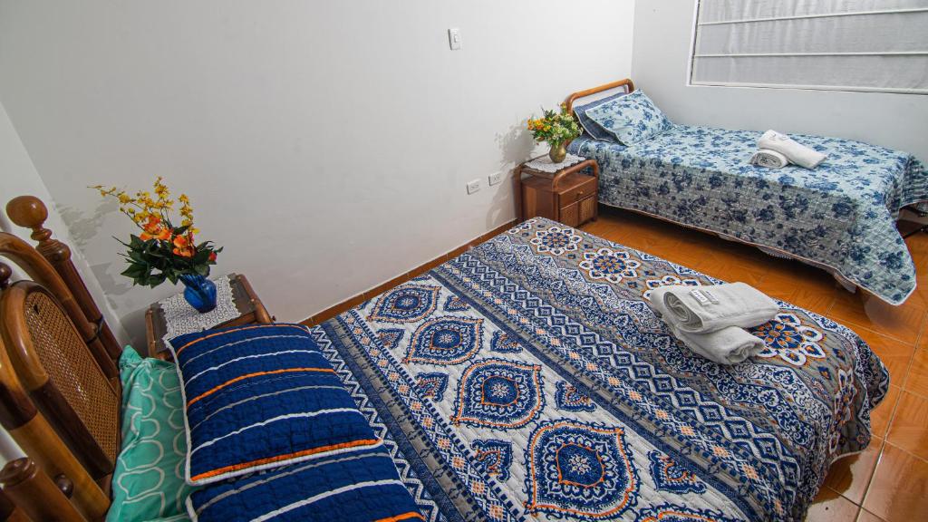 Postel nebo postele na pokoji v ubytování Vivienda Turística "El Coronel"