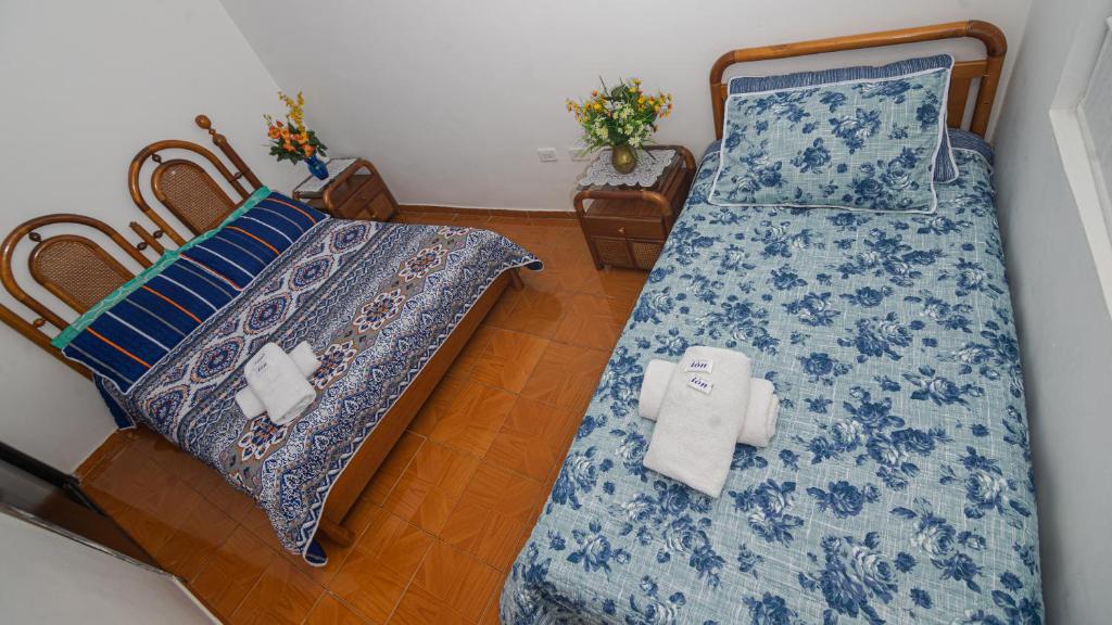 Postel nebo postele na pokoji v ubytování Vivienda Turística "El Coronel"