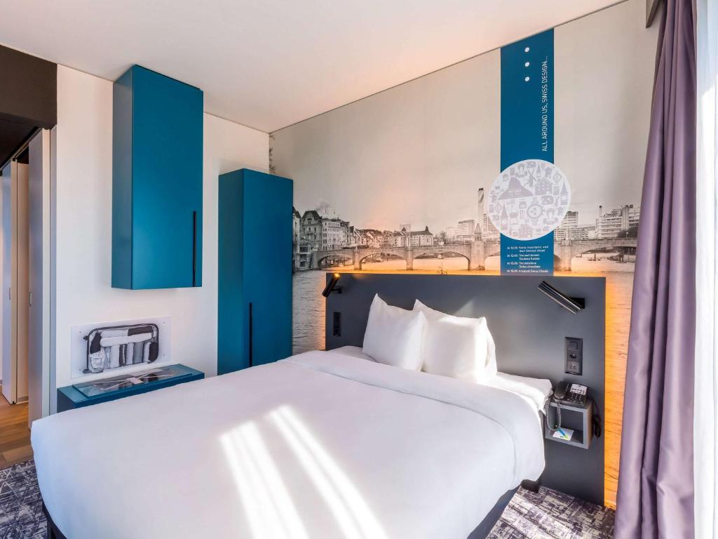 Tempat tidur dalam kamar di ibis Styles Basel City