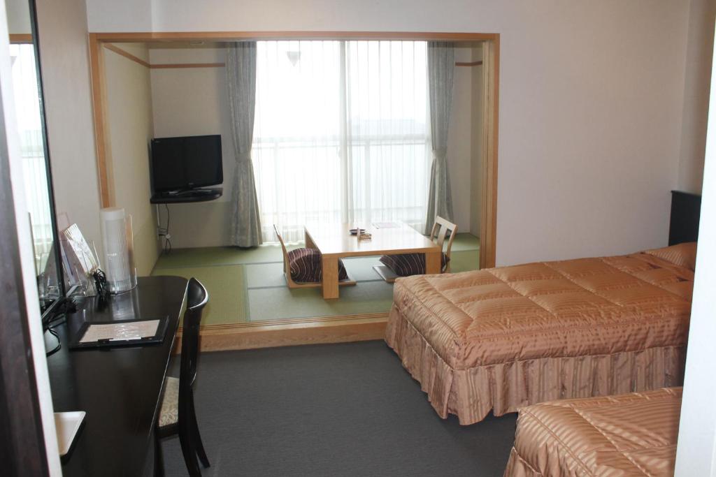 TV a/nebo společenská místnost v ubytování The Gran Resort Elegante Atami