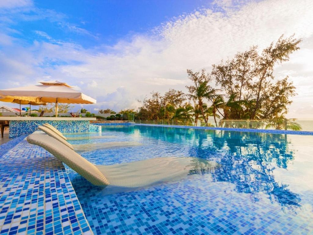 Bazén v ubytování Boracay Uptown nebo v jeho okolí