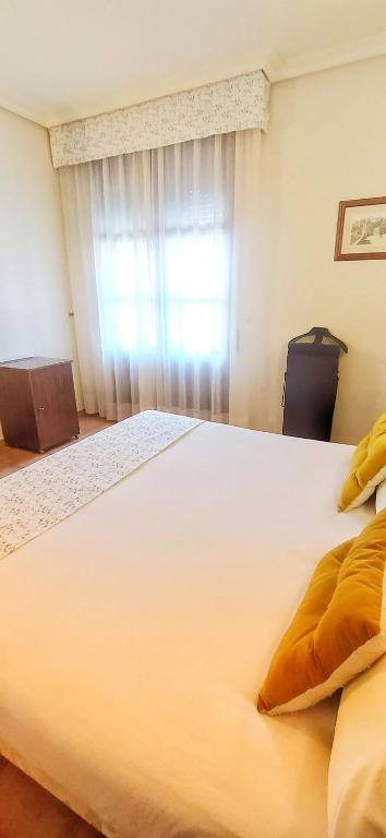 Postel nebo postele na pokoji v ubytování Princesa Galiana
