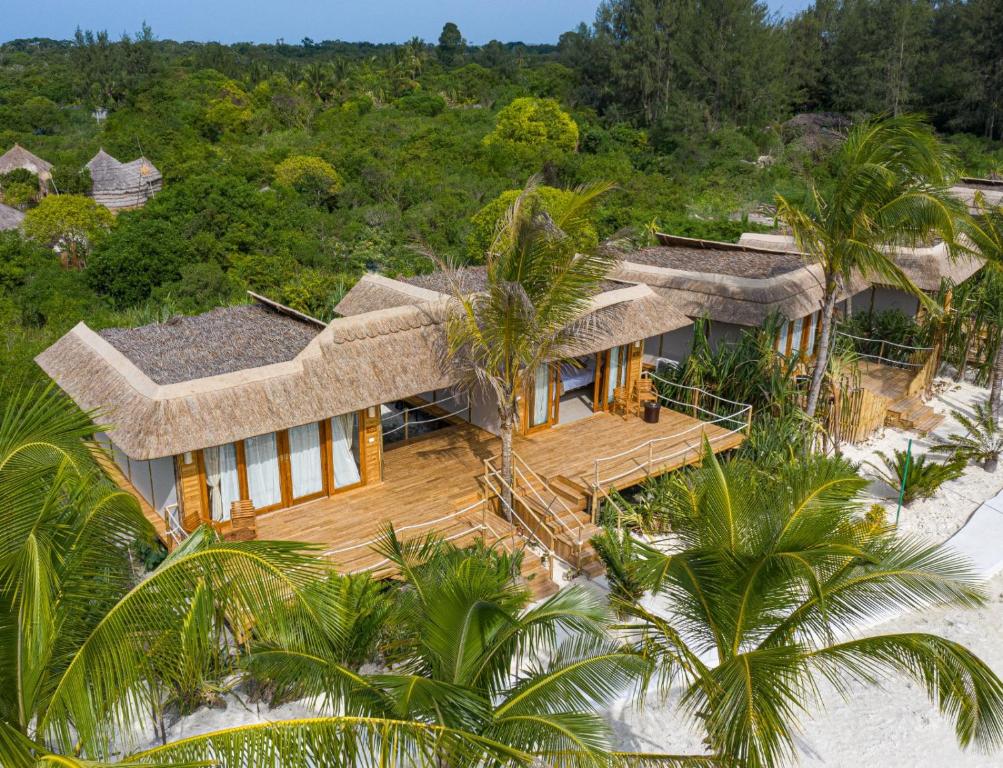 an aerial view of a house on the beach at Fruit & Spice Wellness Resort Zanzibar in Kizimkazi
