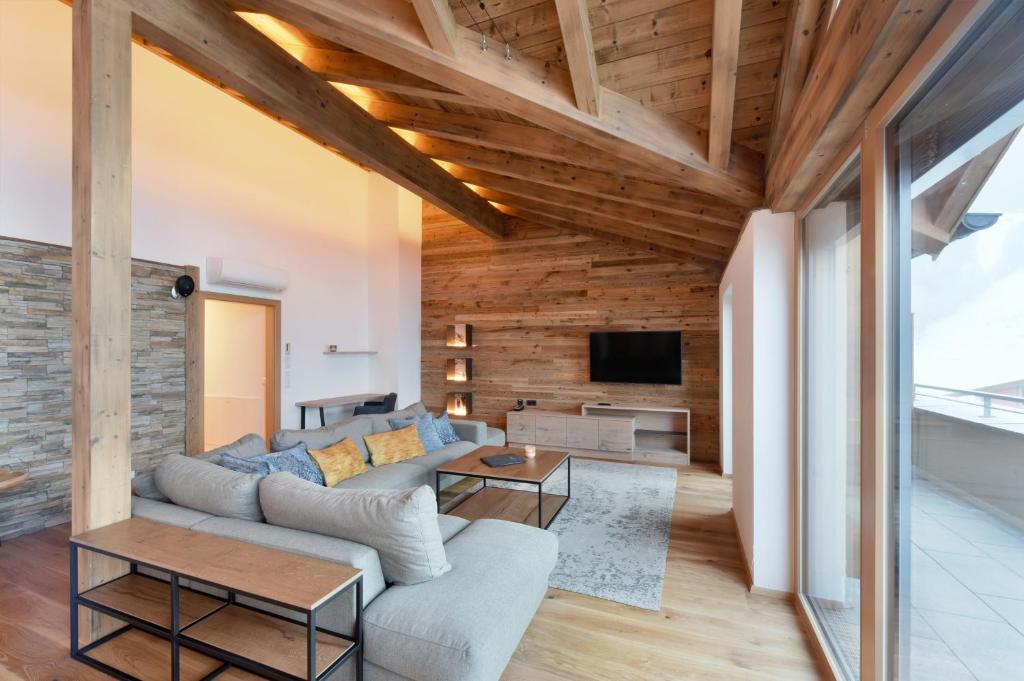 TV a/nebo společenská místnost v ubytování Mountain Hotel Luis
