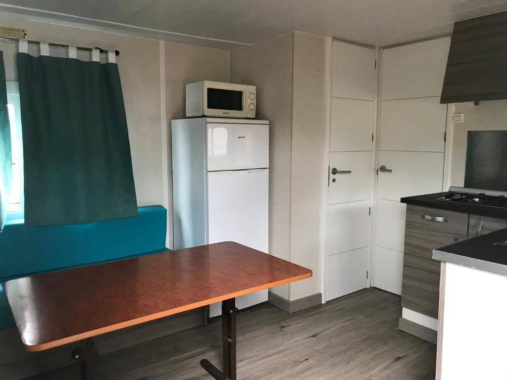 Kuchyň nebo kuchyňský kout v ubytování Camping Castell D'aro
