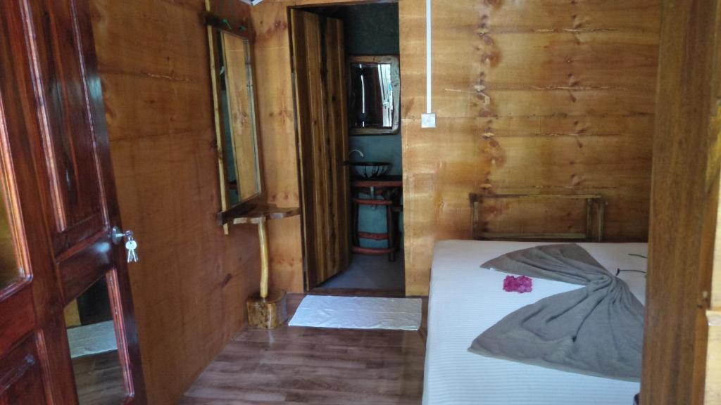 Postel nebo postele na pokoji v ubytování Shan Home Stay Sigiriya