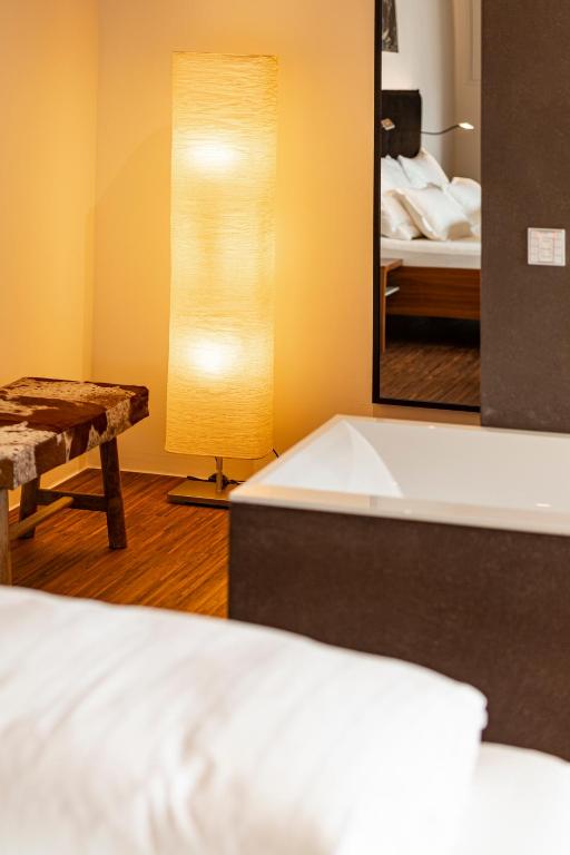 Posteľ alebo postele v izbe v ubytovaní Kronplatz LOFT Bruneck