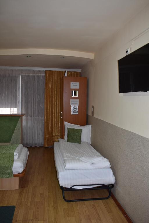 TV a/nebo společenská místnost v ubytování Hotel Zimbru