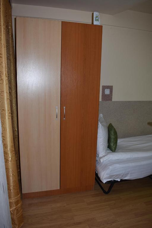 Postel nebo postele na pokoji v ubytování Hotel Zimbru