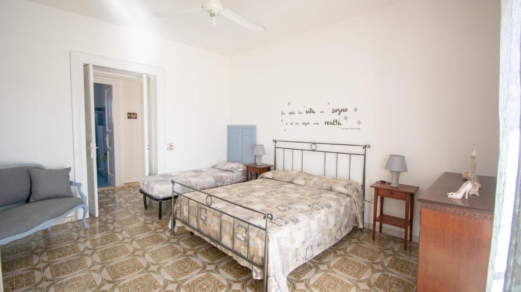 Кровать или кровати в номере VILLA SALINA MONACI